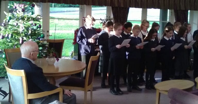 Morland C of E Primary School sing at Grove Court