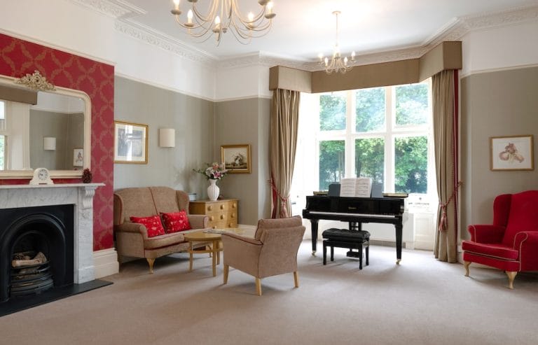 Piano room at Eversfield Care Home